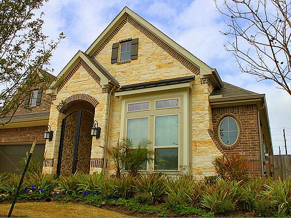 The only house in the neighborhood with this custom courtyard gate.