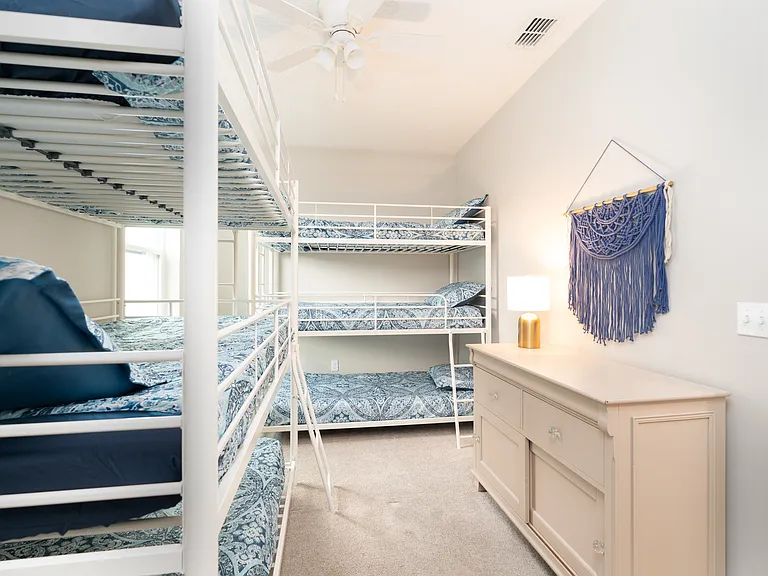 Maximize your group stay! No crowded sleeper sofas here_everyone gets a comfortable, beautifully styled bed in this massive, fun-filled room layout