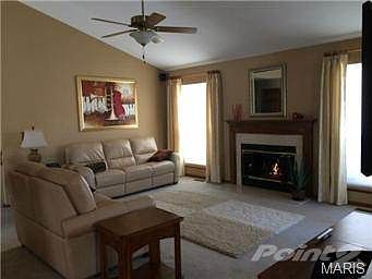 Warm fireplace in great room.