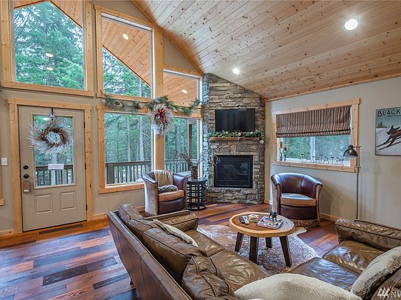 Gas fireplace creates warmth and ambiance in this well kept mountain retreat.