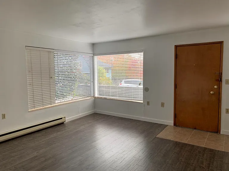 Living room with hardwood floor.