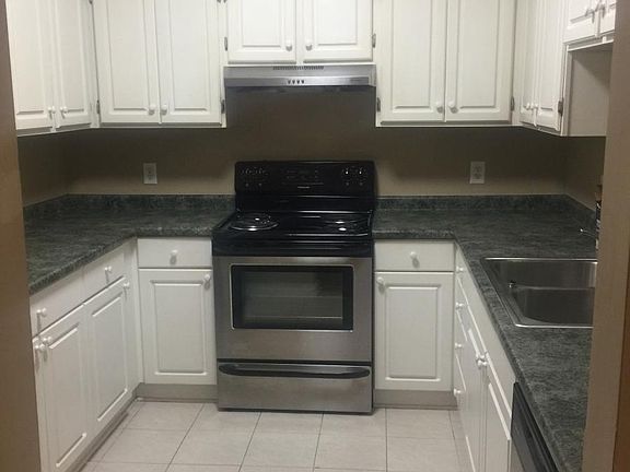Stainless steel appliances and lots of storage in the kitchen