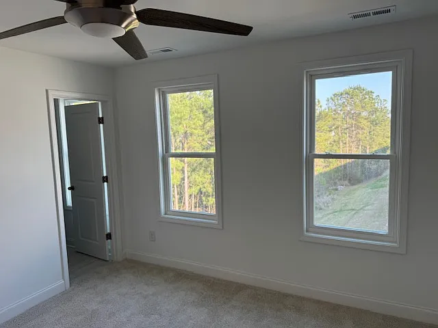 Large guest bedroom with en-suite bathroom and walk-in closet