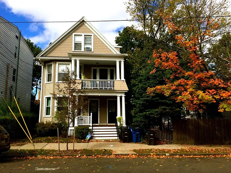 this apartment is on the first floor. there is the porch in front and a small one in back too.