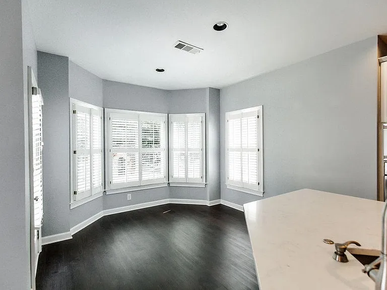 Family dining room with a view of the backyard