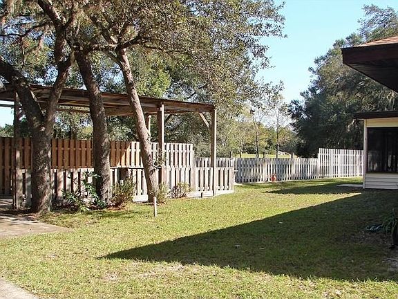 Beautiful view of backyard. RV/Boat covered parking.