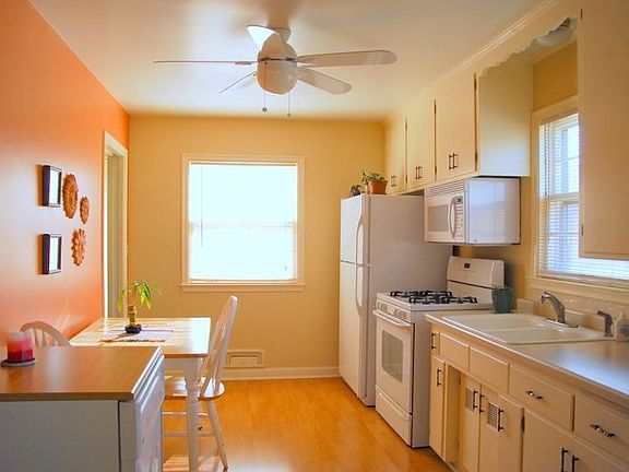 Spacious galley-style kitchen has excellent work spaces.