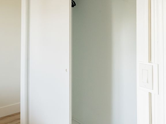 Ample storage in closet.