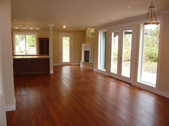 Expansive use of real cherry hardwood floors on main level