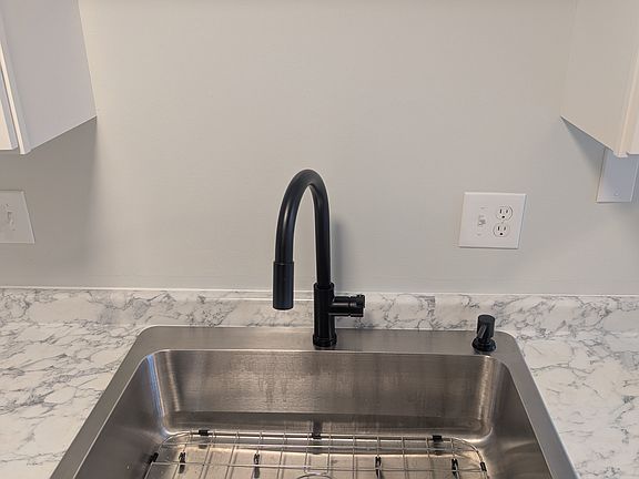 Kitchen sink. 9" deep.