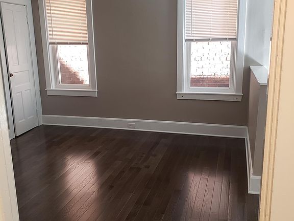 Living room viewed from top of stairs/hallway