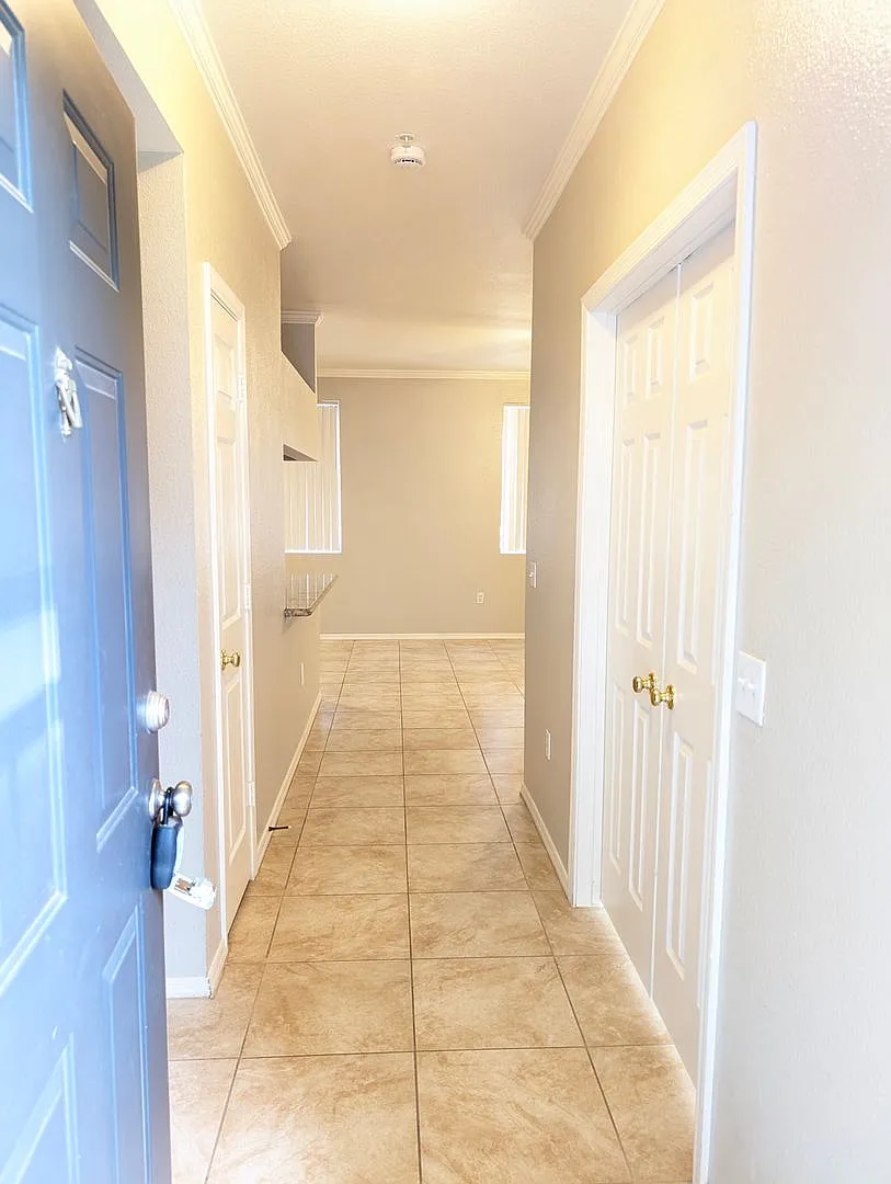 Building Photo - 5345 E Van Buren St #248