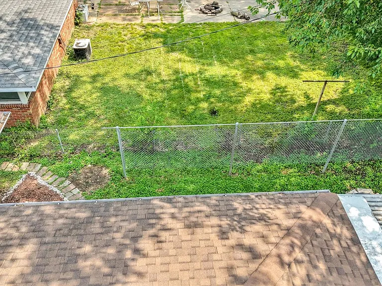 The backyard is fully fenced