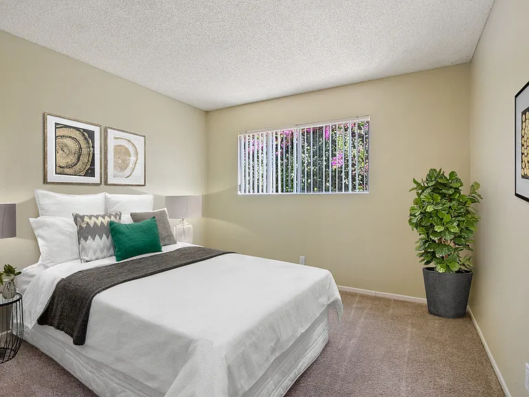Bedroom with carpeted floors
