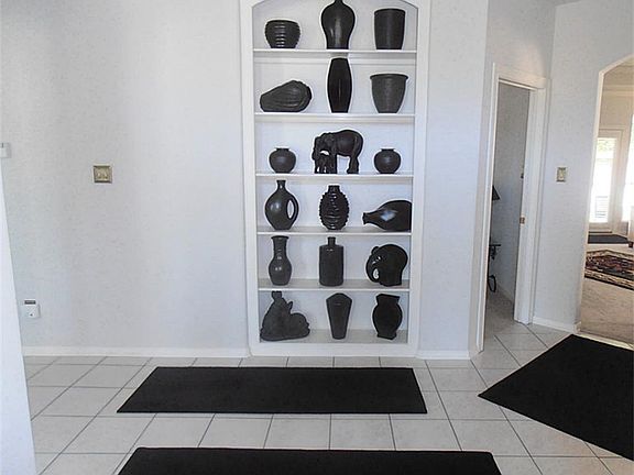 This is the view your guests will have when they come and visit. Custom built in shelves to display 