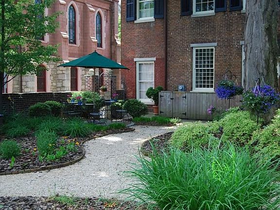 Entering the courtyard from the Carriage House.