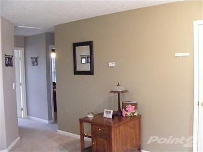 Front hallway to bedrooms! Deep closet just around the corner.