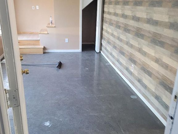 Living room and stairs to upper bedroom