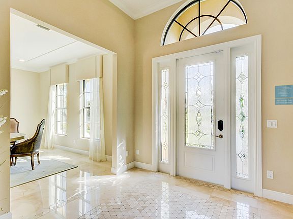 Formal dining room off foyer