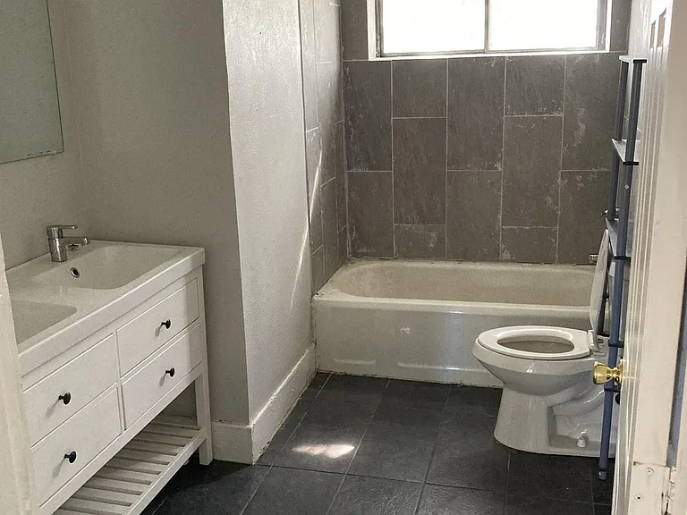Bathroom with new tile, double vanity and lots of storage!