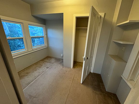 Bonus room/office with windows facing shared backyard.