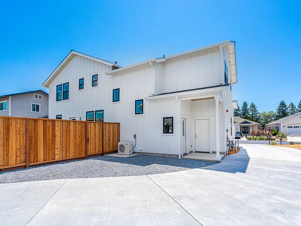 Upstairs unit is the door on the left, under the alcove. There is now a fully fenced yard off the alcove.