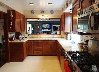 Kitchen looking out towards family room.