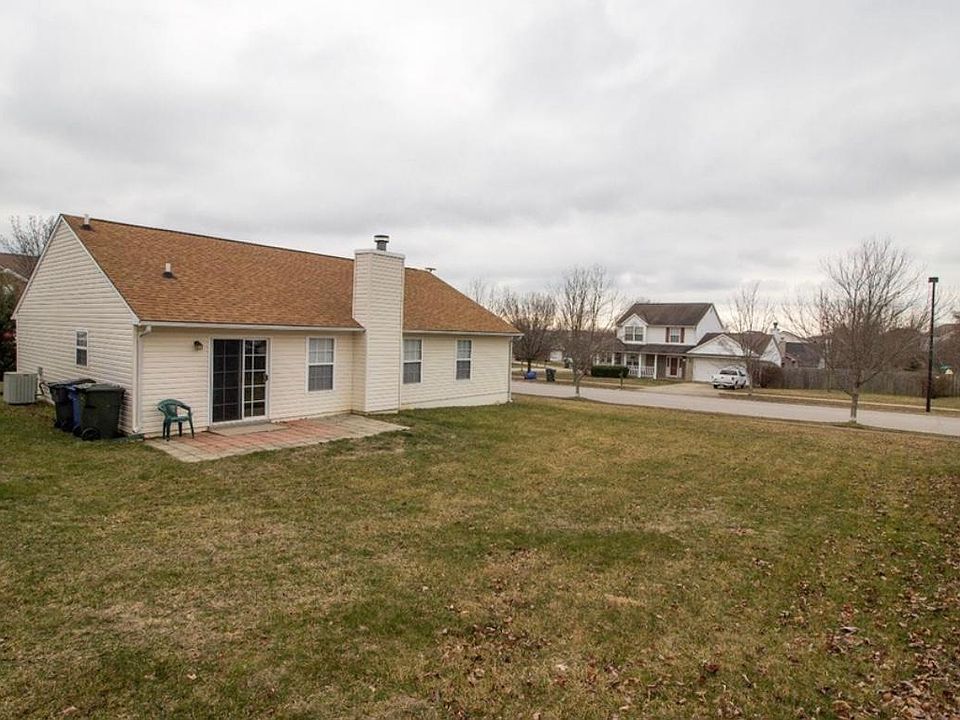 Photo is out-dated and does not display the fenced in yard or metal gazebo over patio.