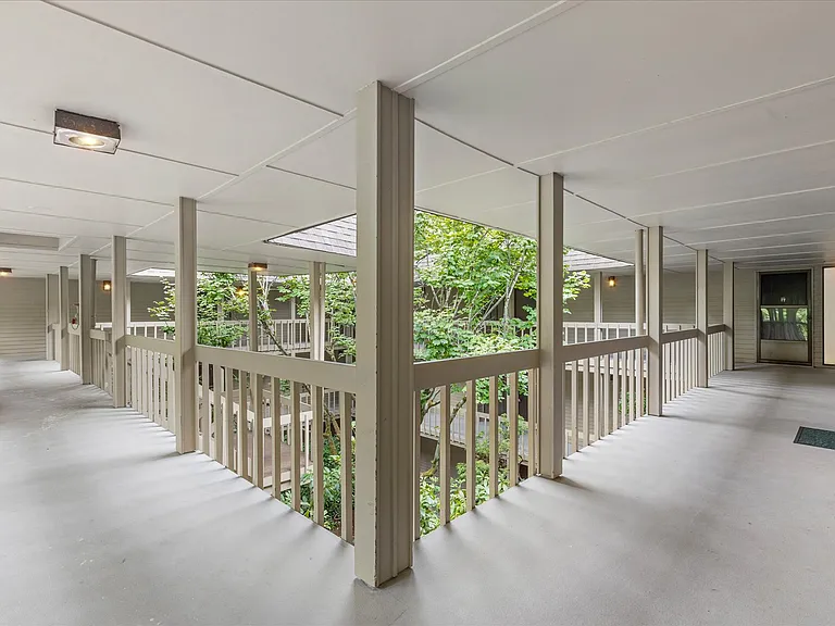 Large covered walkways. Only one flights of stairs up from carpark.