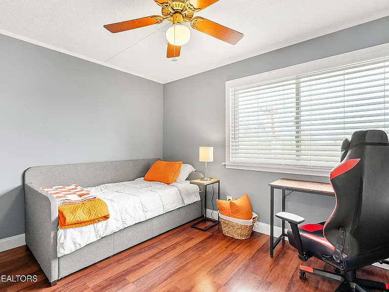 Bedroom 2: Twin Trundle Bed, Portable A/C Unit, Ceiling Fan, Desk, Chair, Night Stand W/Lamp, Floor Rug, and Hangers. 
Bedding: Sheets, Pillows, Comforters, and Blankets.