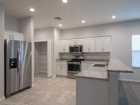 Beautiful, gourmet kitchen with pantry, granite an