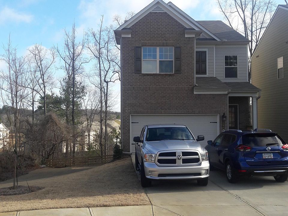 House with side yard and basement walkout entrance.