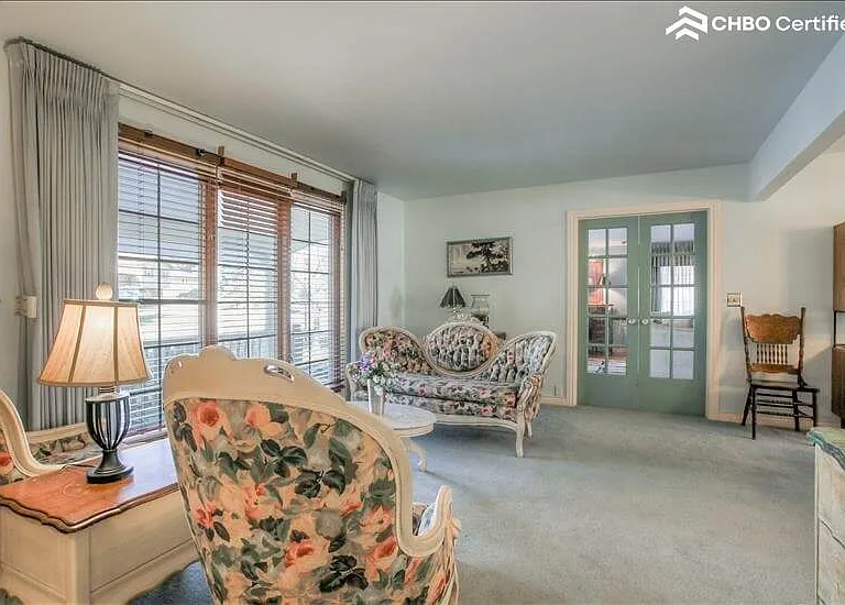 Formal living- French doors to t.v. room.