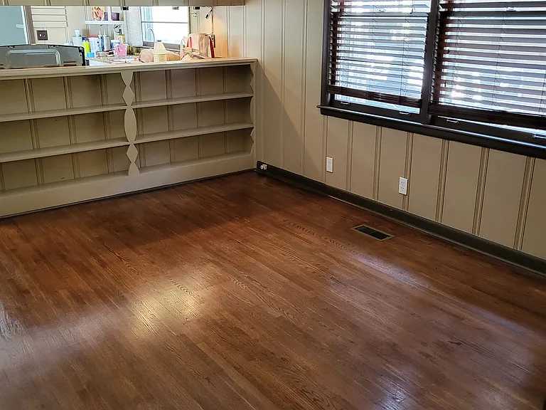 Den area with built in shelving.