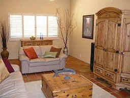 Living Room:Plantation Shutters, Vaulted Ceilings, fans, New Satillo Tile Open