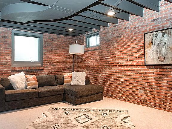 Downstairs den, very cozy and comfortable.