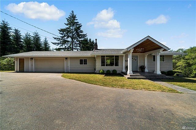 Fulll view of the front of home that sets the tone for this beautiful home!