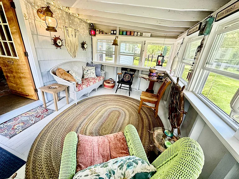 The vintage themed porch is simply delightful!