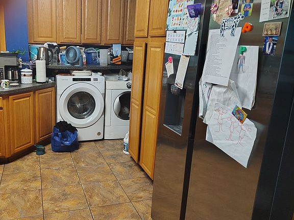 Kitchen with the washer and dryer