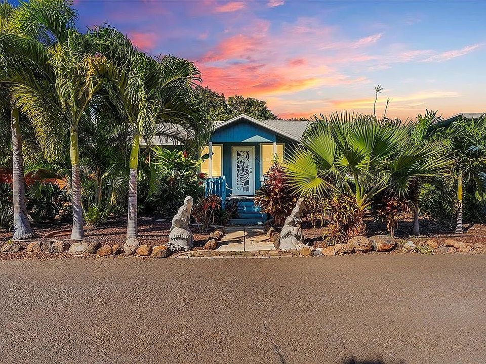 Front of house at sunset.