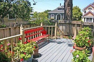 Beautiful side yard w/deck