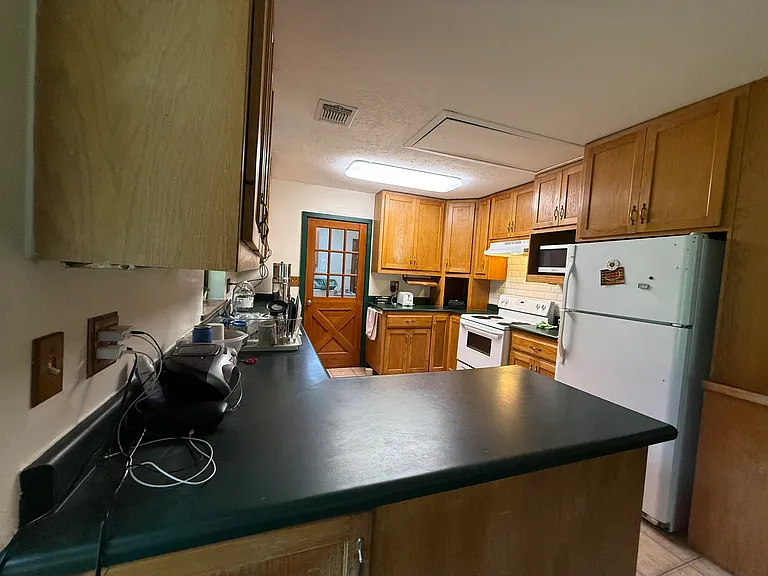 Another view of the kitchen