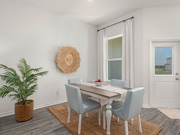 Enjoy family dinners in this spacious dining room