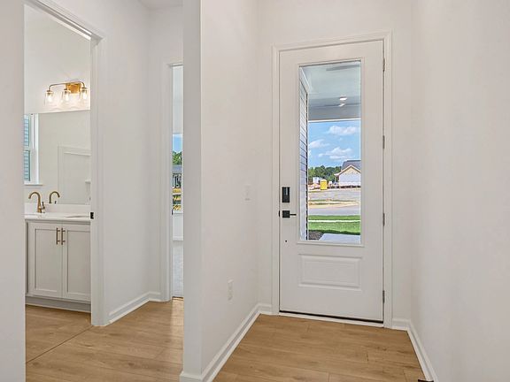Foyer featuring the AW Collection R Serene - Soft light and open space create a calm welcome.