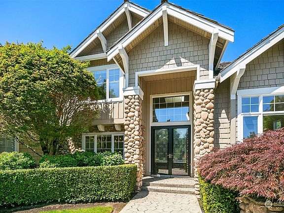 Commanding front entry welcomes you home.>