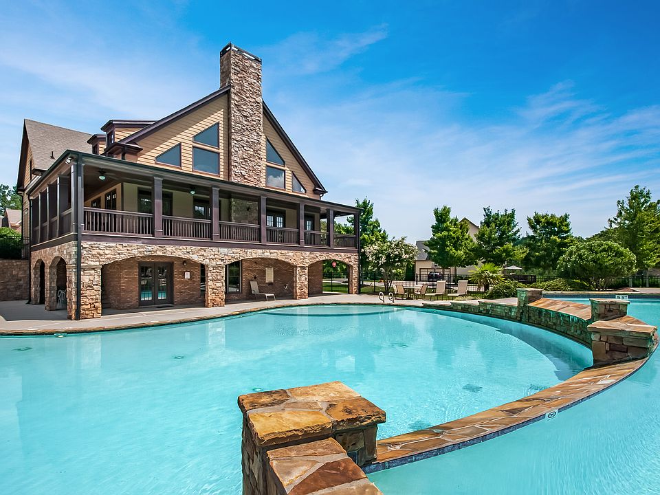 New homes available at The Reserve at Liberty Park in Braselton, GA featuring a large swimming pool