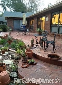 Designer Patio
						:
						Large outdoor living area opens from Master bedroom, Family Room and Sunroom