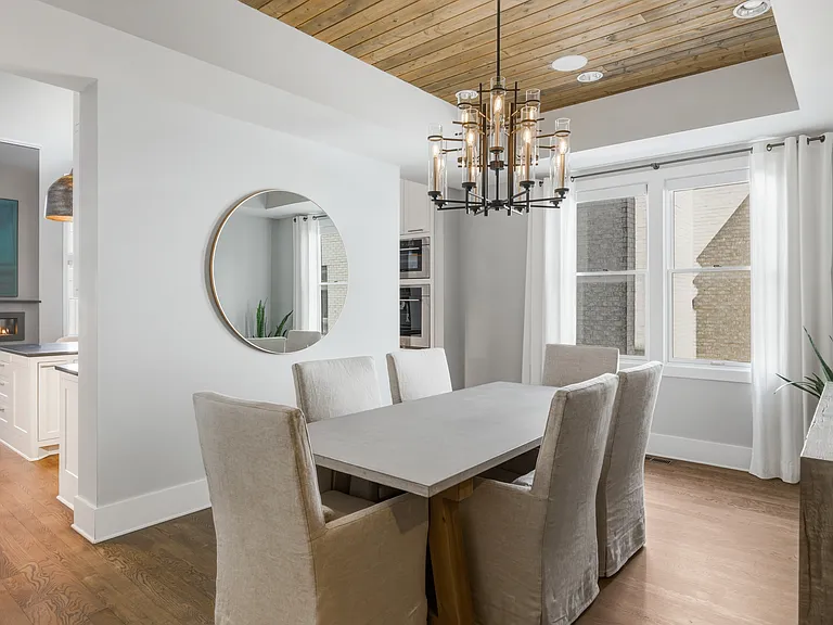 Bright dining room with seating for 6.