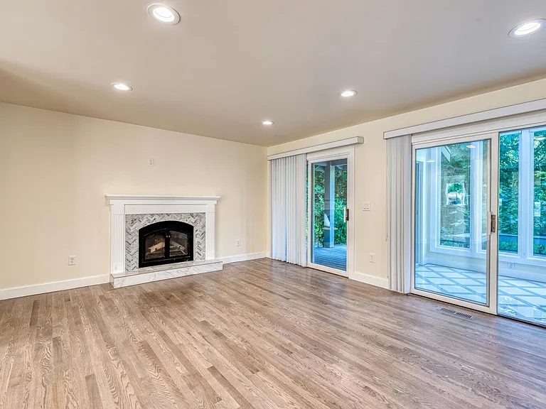 Living Room area with a special sunroom close by to relax in