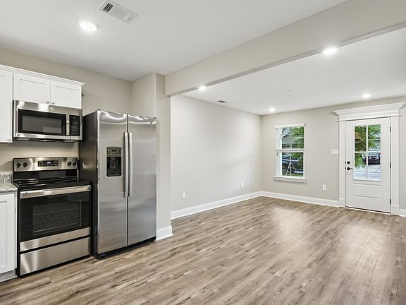 Great room in the Parker floorplan at a Meritage Homes community in Gulfport, MS.